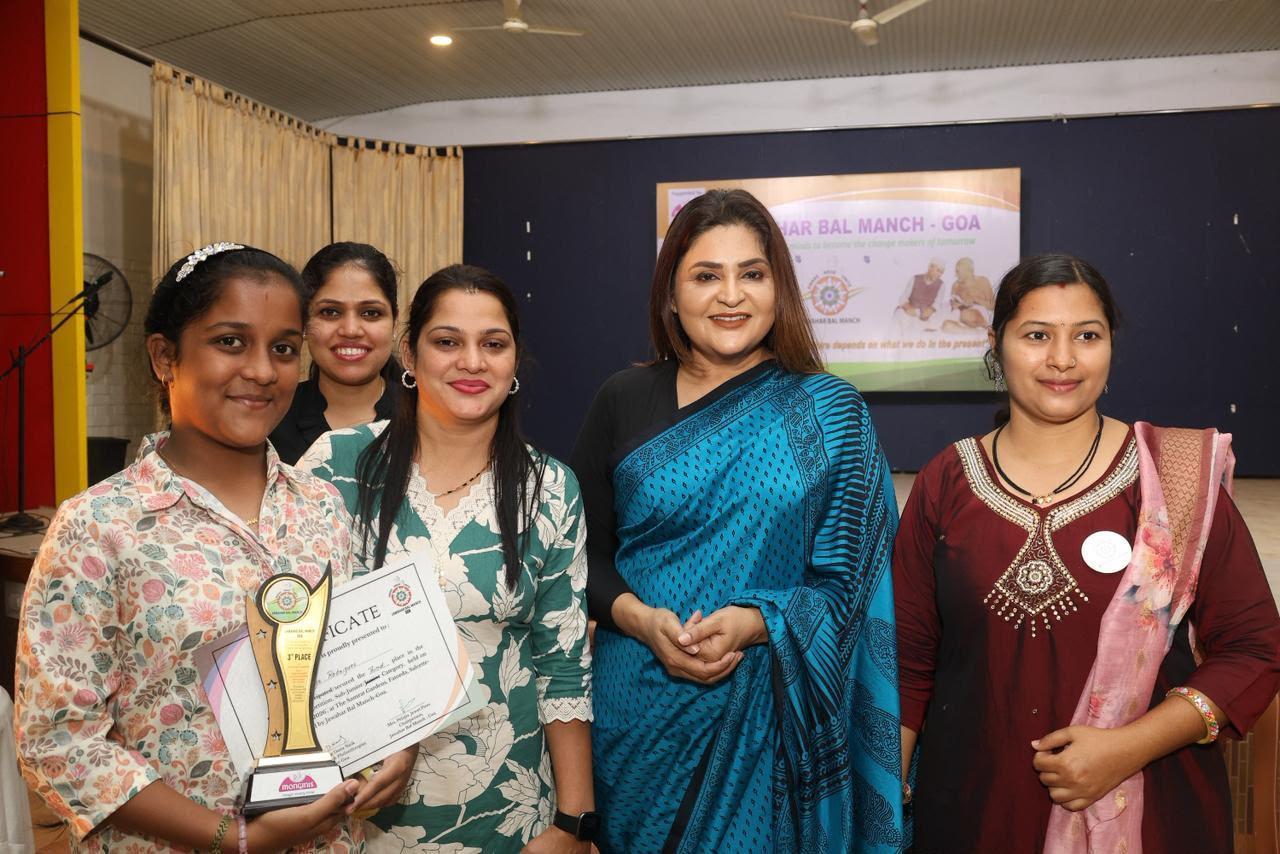 Women gathered with certificates at a community event